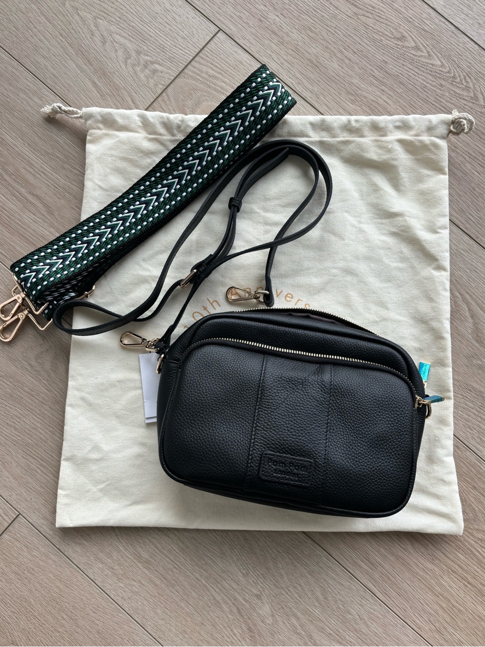 Black Pebbled Leather Crossbody Bag with Detachable Patterned Strap